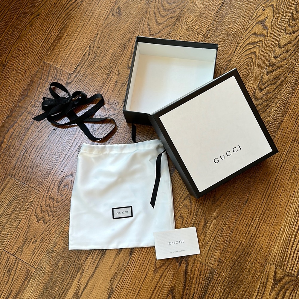 Authentic Gucci gift box, satin bag, ribbon. Empty, no contents inside.